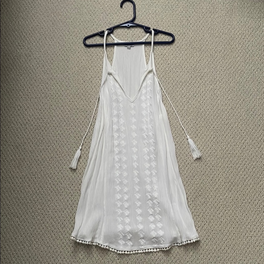 Never worn, White Sleeveless tank with Tassels